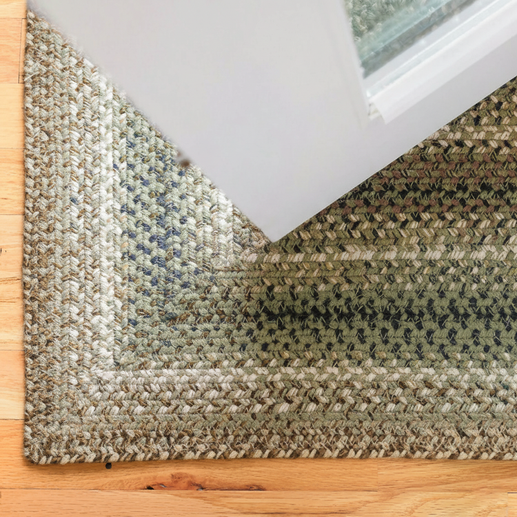 Braided jute rug lying flat in a doorway