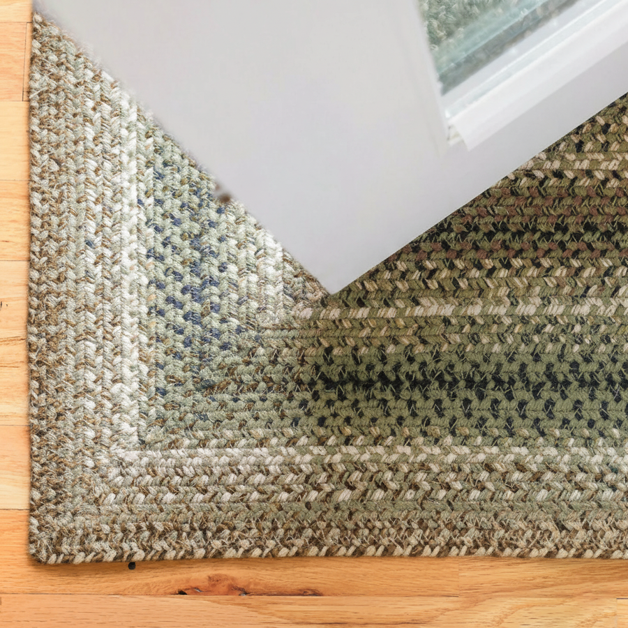 Braided jute rug lying flat in a doorway